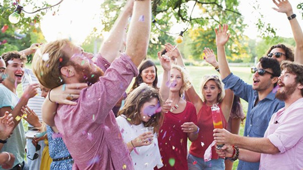 A group celebrating together outdoors