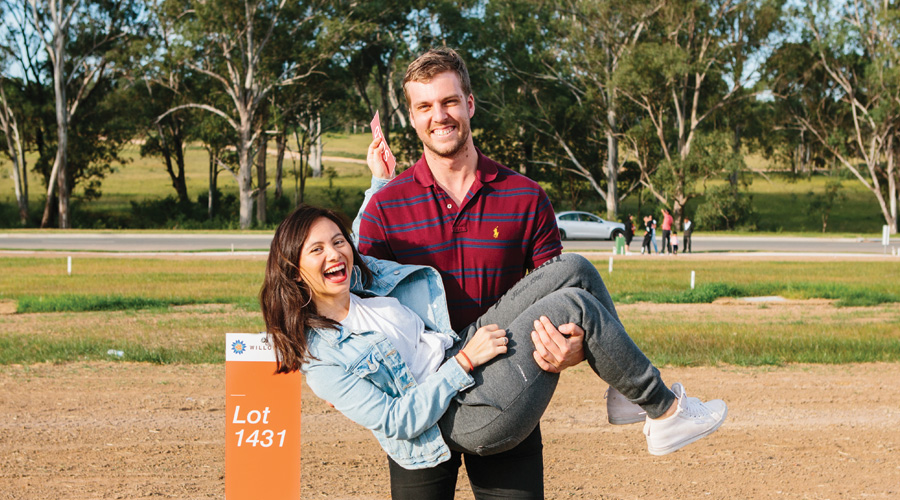 Future Willowdale residents Gavin and Jelita walk their lot at the Willowdale 'Walk Your Lot' event at Denham Court (NSW).