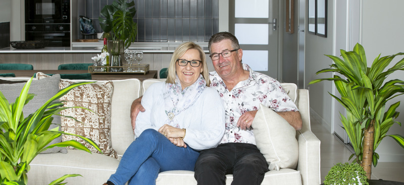 Halcyon Rise homeowners sitting on couch