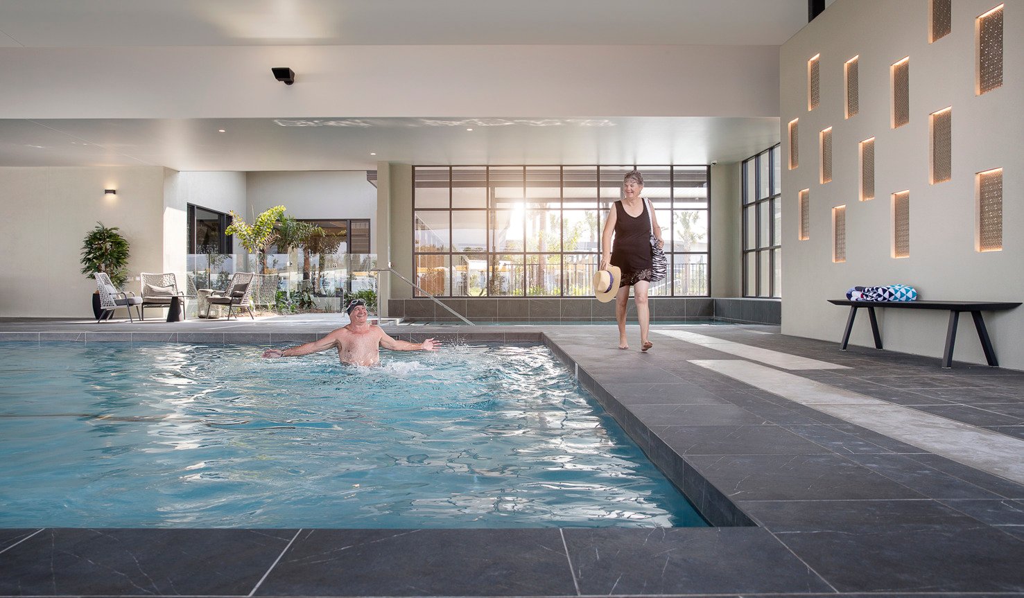Homeowners enjoying the undercover indoor pool at Halcyon Greens