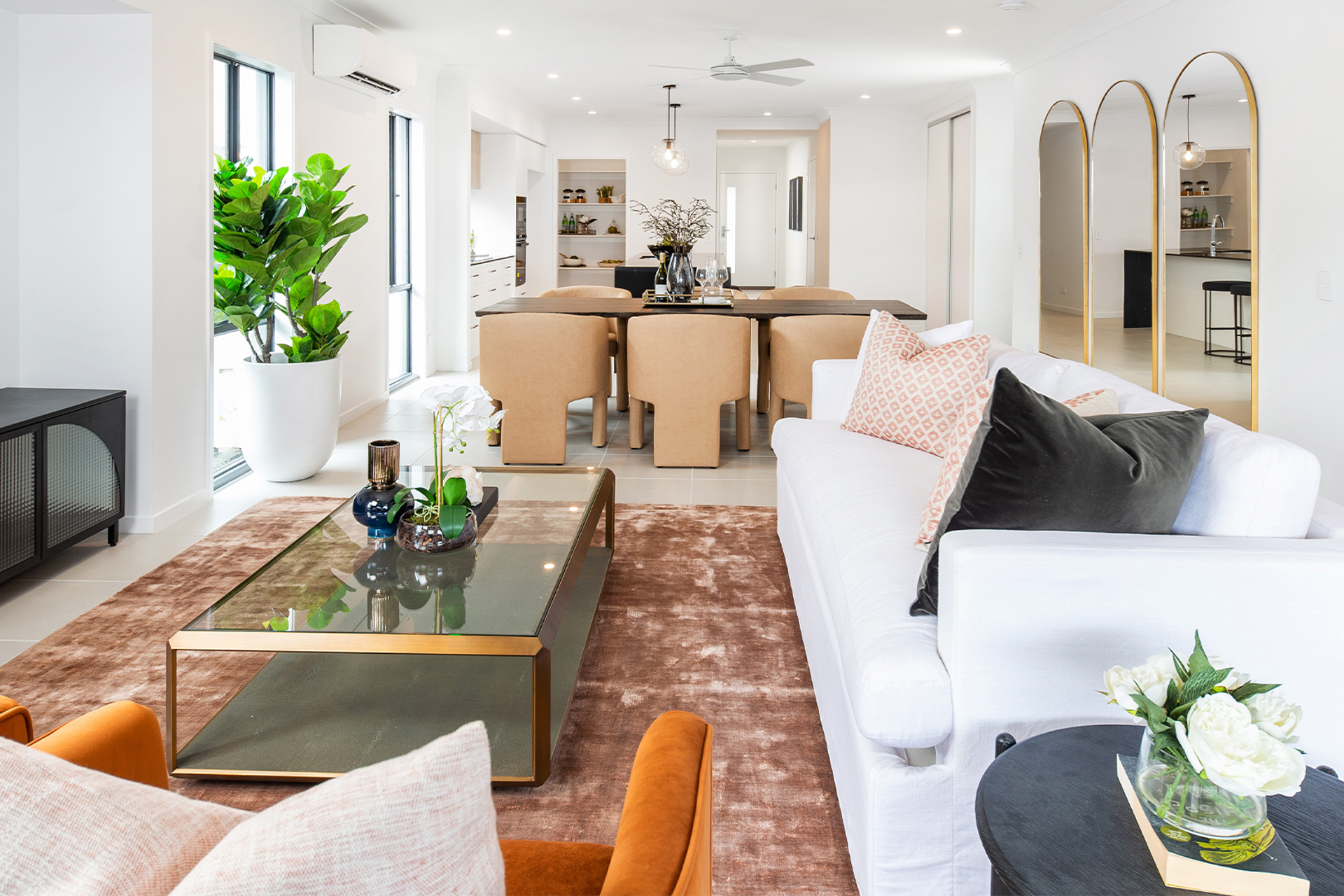 An internal render of the lounge area with modern display furniture at one of the display homes at Halcyon Rise.