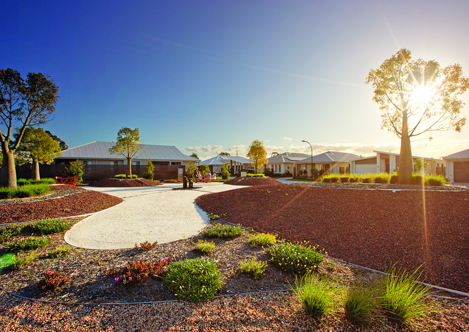 An external shot of the homes at Halcyon Glades in Caboolture with trees lining the homes