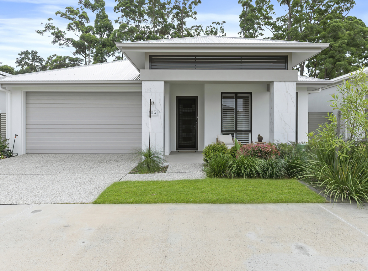 External front house facade with white exterior paint colours