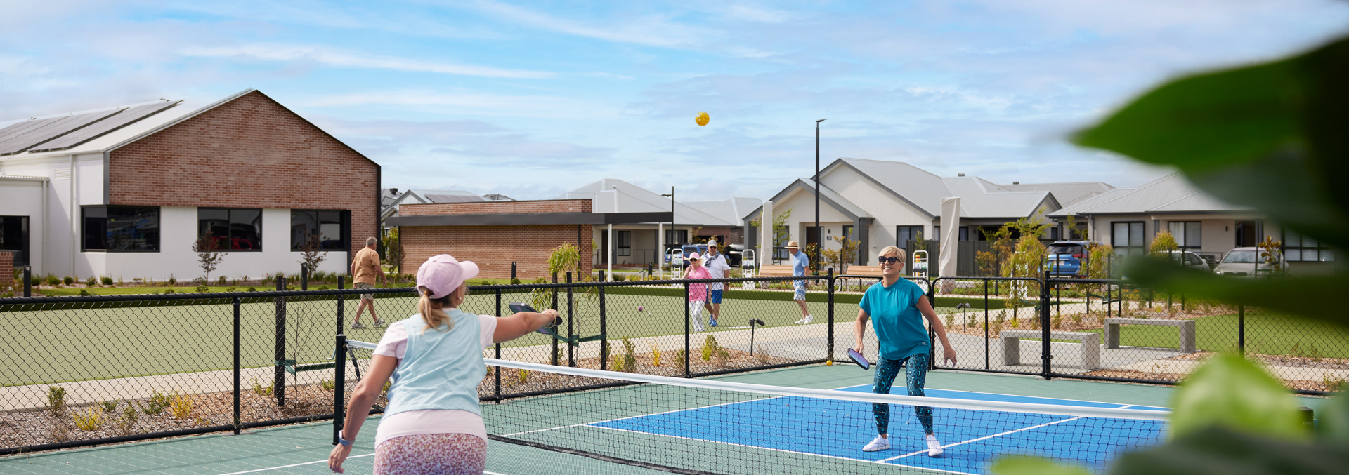 People playing pickleball at the Berwick clubhouse