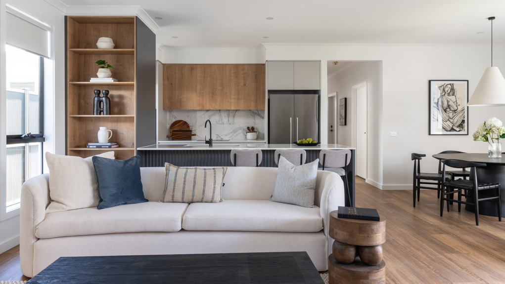 A photo taken of the Napier living room and kitchen in the display home.