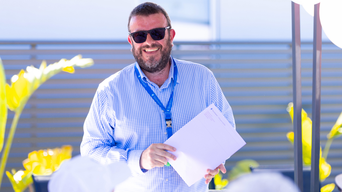 A photo taken of Jardin's community manager, Chris, at a homebuyer event