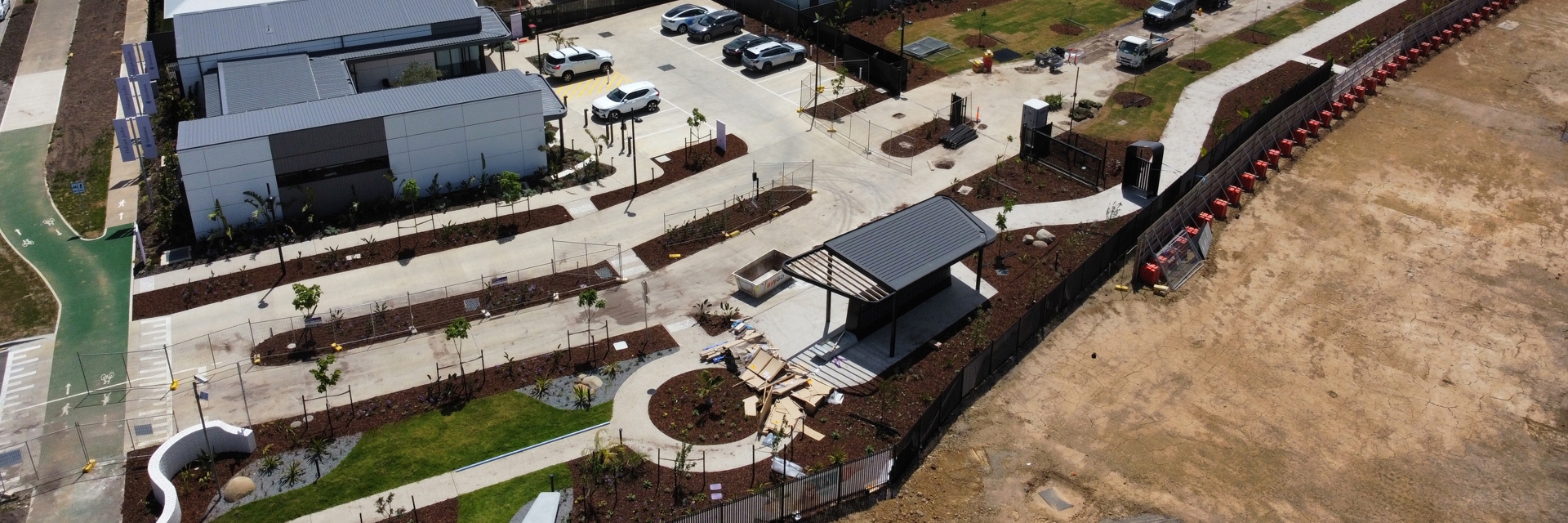 An aerial drone photo of the driveway and landscaping construction at Halcyon Jardin