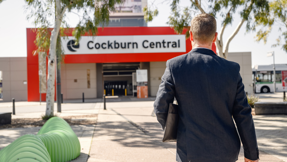 Man walking towards Cockburn Central