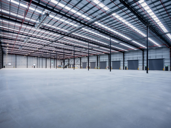 Empty warehouse with roller doors
