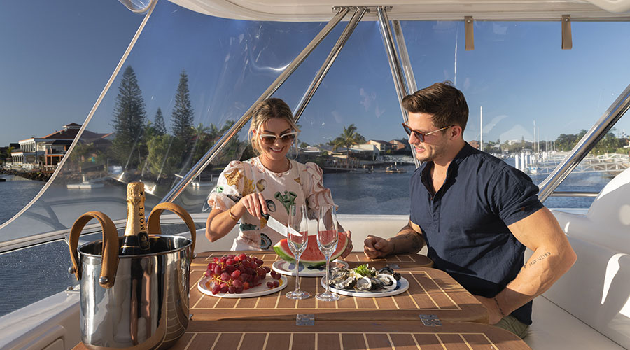 Couple dining on boat