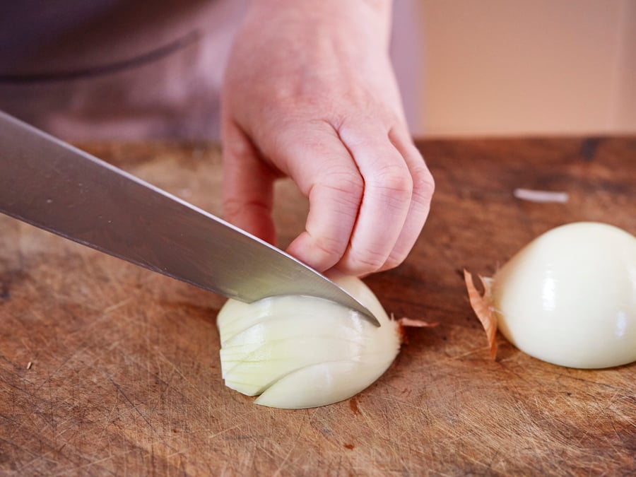 Using the claw  on an onion