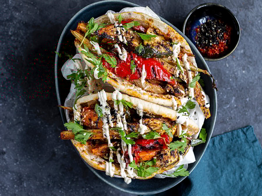 Vegetarian kebab with garlic sauce in pita pockets.