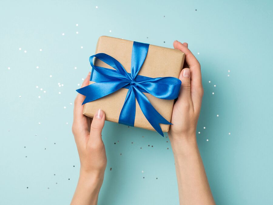 Hands holding a wrapped present