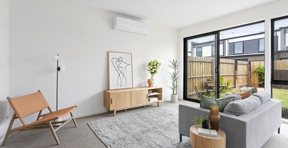 The open plan living area of an Apollo townhome at Stockland Orion in Braybrook.