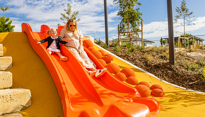 Children and Mother on slide