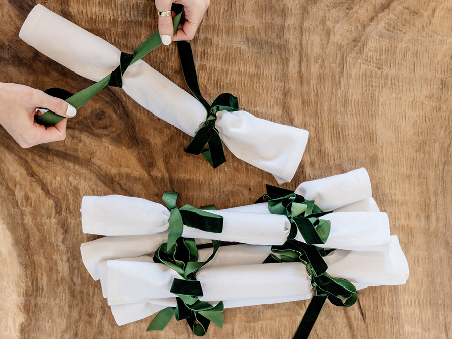 DIY Linen Christmas bon bons being tied up