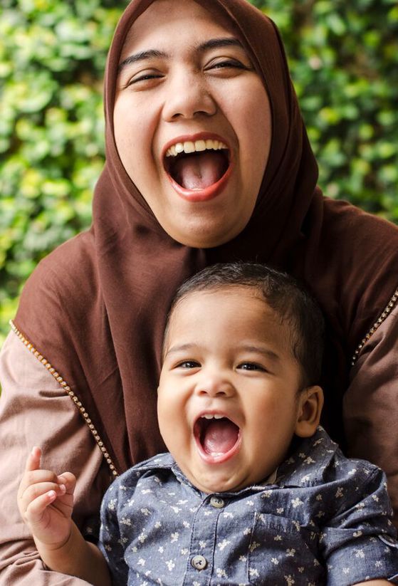 Mum and bub having a good laugh together