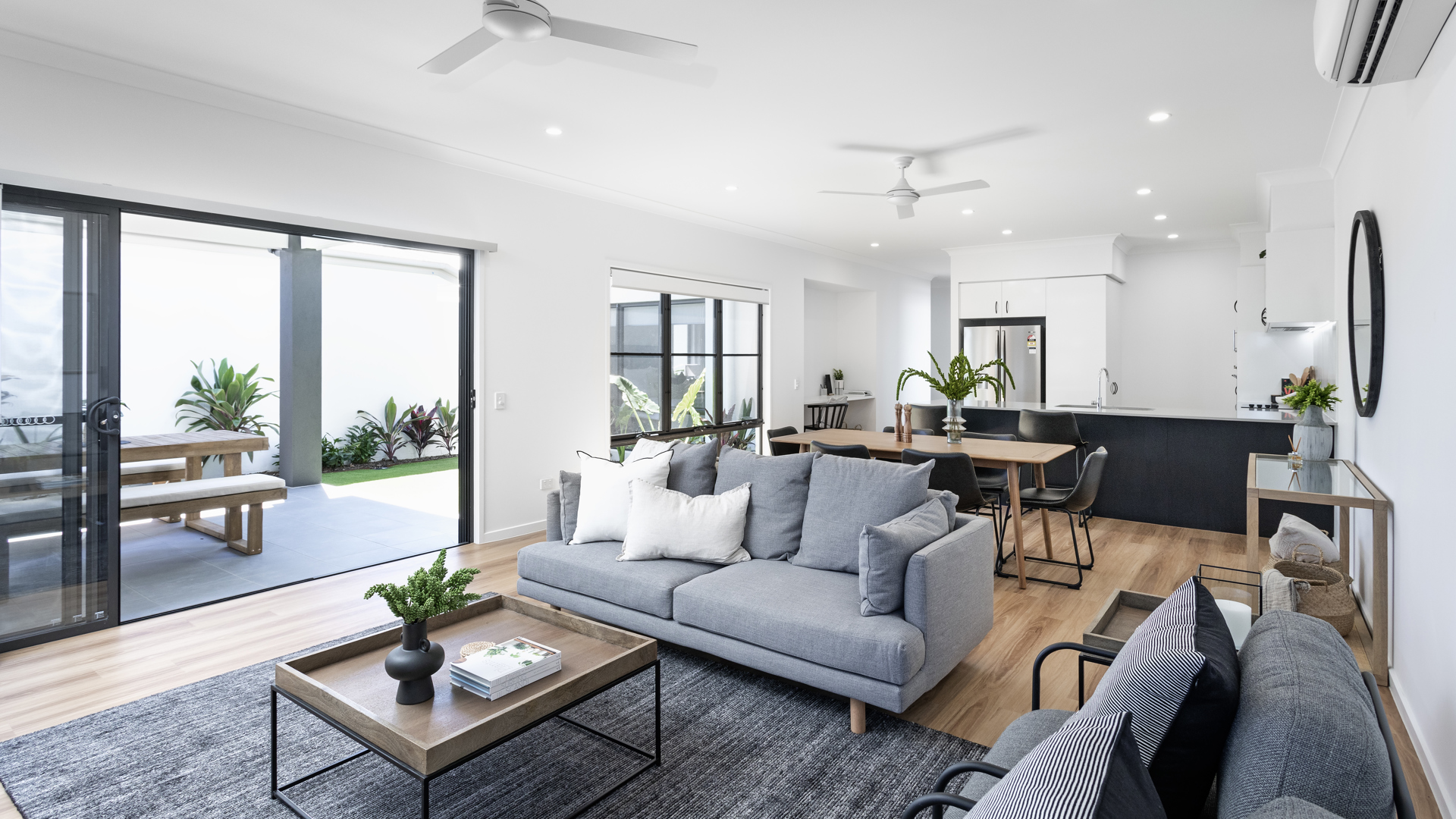 Beautiful modern interior living room display at a Stockland Halcyon community